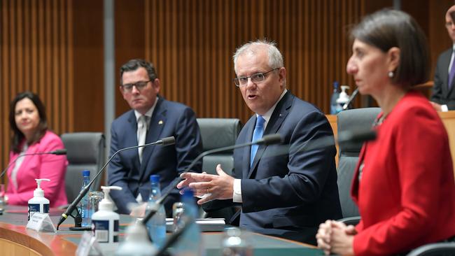 Prime Minister Scott Morrison, second from right, together with state Premiers Annastacia Palaszczuk, left, Daniel Andrews and Gladys Berejiklian address the media. Picture: Getty Images