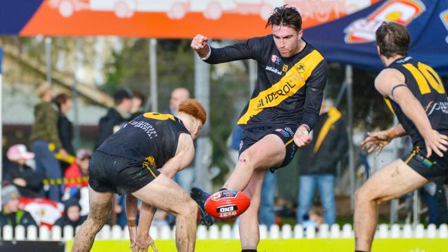 Glenelg is going so well, Brad Agnew seems to attempting to help Port Adelaide by smothering Liam McBean’s kick. Picture: Brenton Edwards