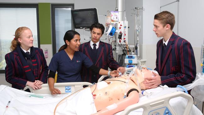 Royal North Shore ICU nurse Kabita Shadha with Barker College students (left to right) Lucinda Allen, Joshua Sneddon and Kai Denton