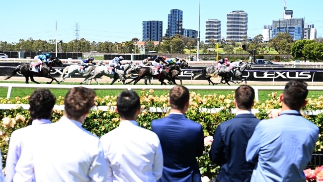 Up to 10,000 fans have flocked to the Flemington track for the Melbourne Cup after crowds were banned last year. Picture: Quinn Rooney/Getty Images