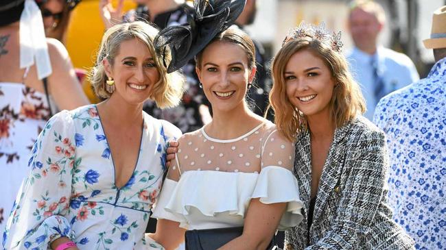 FROCKED UP: Rachel Hohenhaus, Taryn Koch and Stacey Creedy at the 2019 Ipswich Cup. Picture: Rob Williams