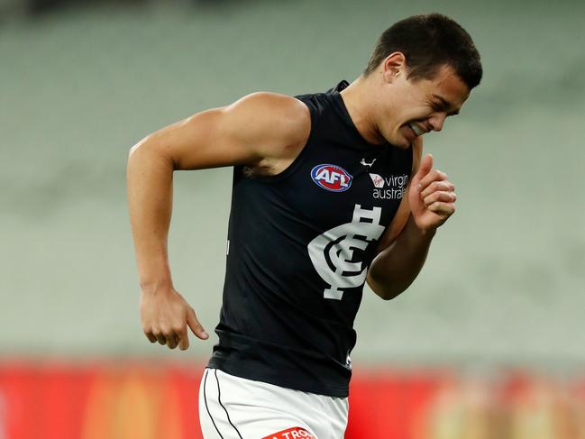 Jack Silvagni leaves the field after the “love tap”.