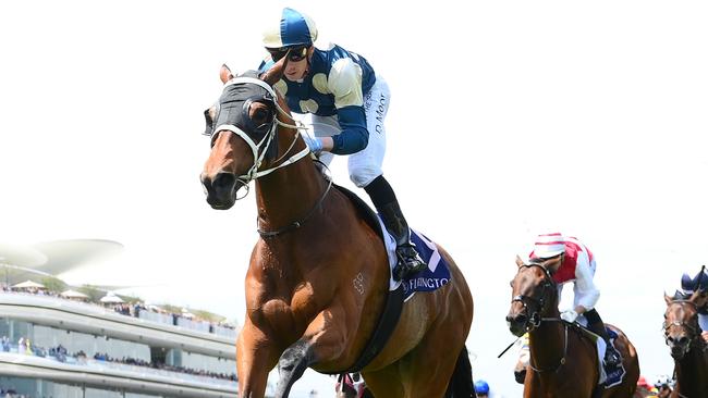 Muramasa surges clear to win the Queen Elizabeth Stakes at Flemington on Champions Day. Picture: Quinn Rooney/Getty Images