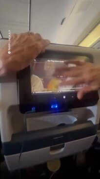 Feeling hands on? This traveller is in for a long flight.