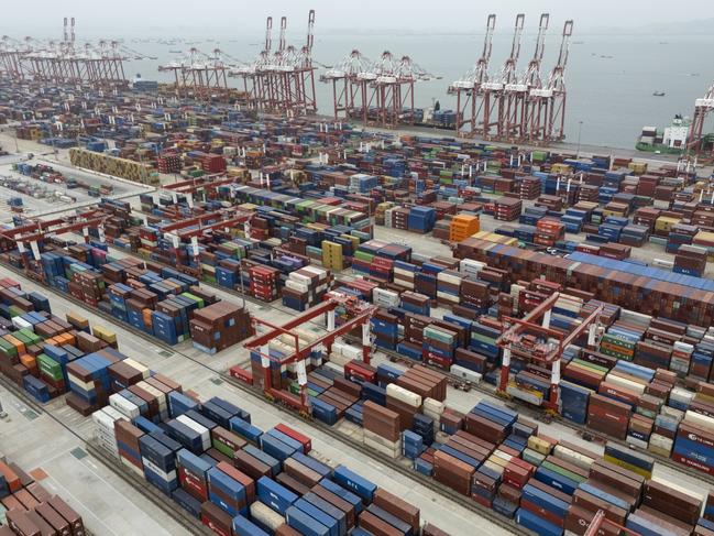 FILE - Shipping containers are seen ready for transport at the Guangzhou Port in the Nansha district in southern China's Guangdong province, April 17, 2025. (AP Photo/Ng Han Guan, File)