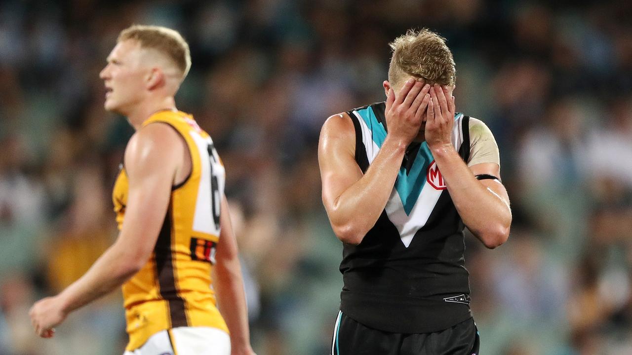 Xavier Duursma can’t watch another Hawthorn goal. Picture: Sarah Reed/AFL Photos via Getty Images