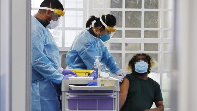 A new inmate is given a COVID vaccine on arrival at Silverwater. Picture: Sam Ruttyn