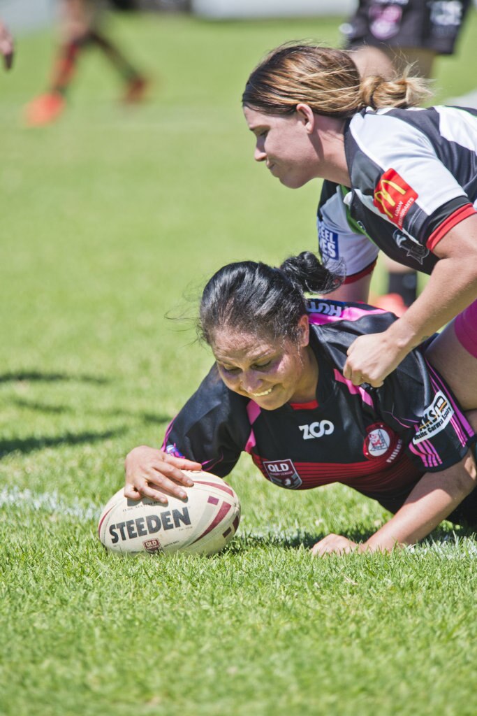 Rosie Parsons scores a try for Toowoomba. Picture: Nev Madsen