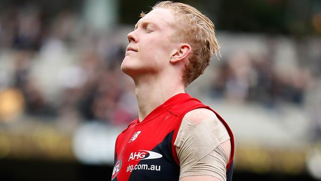 Clayton Oliver dejected after the Round 23 loss to Collingwood.