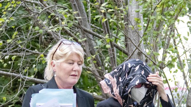 Con artist Samantha Azzopardi (aka Emily Bamberger) leaves Picton court house with her lawyer. Picture: Simon Bullard