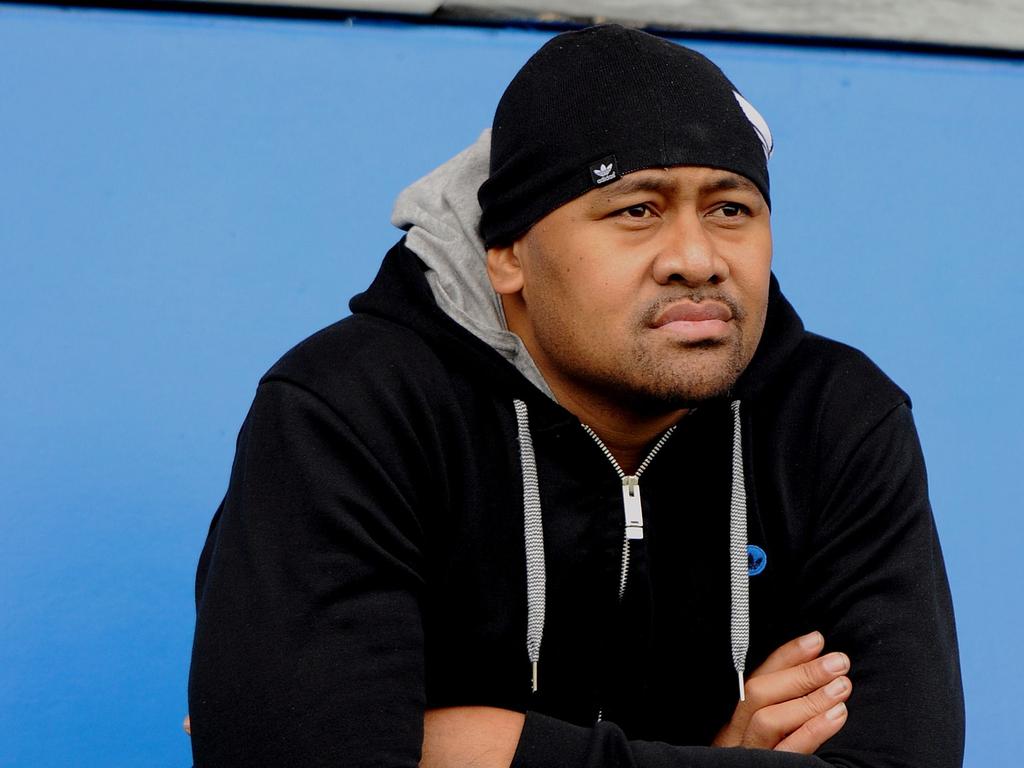 Jonah Lomu watches a Wallabies training session at North Harbour Stadium during the 2011 Rugby World Cup.