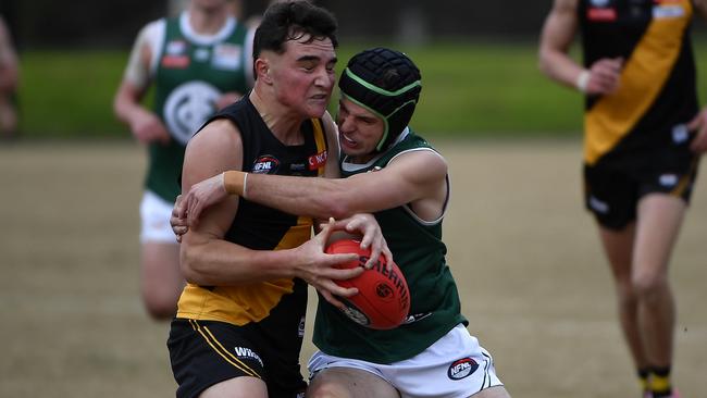 NFNL: Northern Football Netball League Division 1, Melbourne Greyhounds Seniors, Round 15. Heidelberg v Greensborough at Warringal Park, Heidelberg, Victoria, Saturday, 3rd August 2024. Jack Andrew, left, tackled by Jackson Hasler. Photo: Andrew Batsch