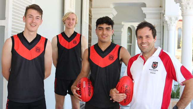 Triple Magarey Medallist and Rostrevor College football director and first XVIII coach James Allan with players (from left) Matthew Dnistriansky, Ned Carey and Xavier Tranfa. Picture: Rostrevor College