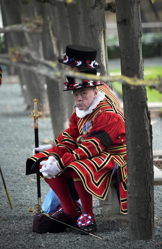 A Beefeater takes a break in Westminster Hall Gardens. Picture: Christopher Furlong