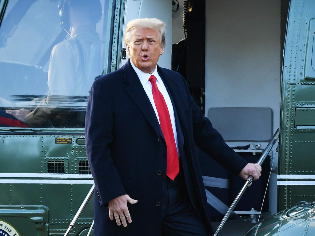 Donald Trump boards Marine One at the White House in Washington, DC for the final time. Picture: AFP