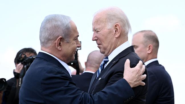 Benjamin Netanyahu greets Joe Biden at Tel Aviv's Ben Gurion airport last year. Picture: AFP