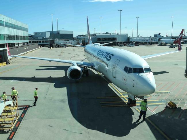 MELBOURNE, AUSTRALIA - NewsWire Photos 30 March , 2021:  A Qantas flight arrives at Melbourne Airport  from Brisbane which is currently in a 3 day lockdown due to a Covid-19 outbreak. Picture : NCA NewsWire / Ian Currie