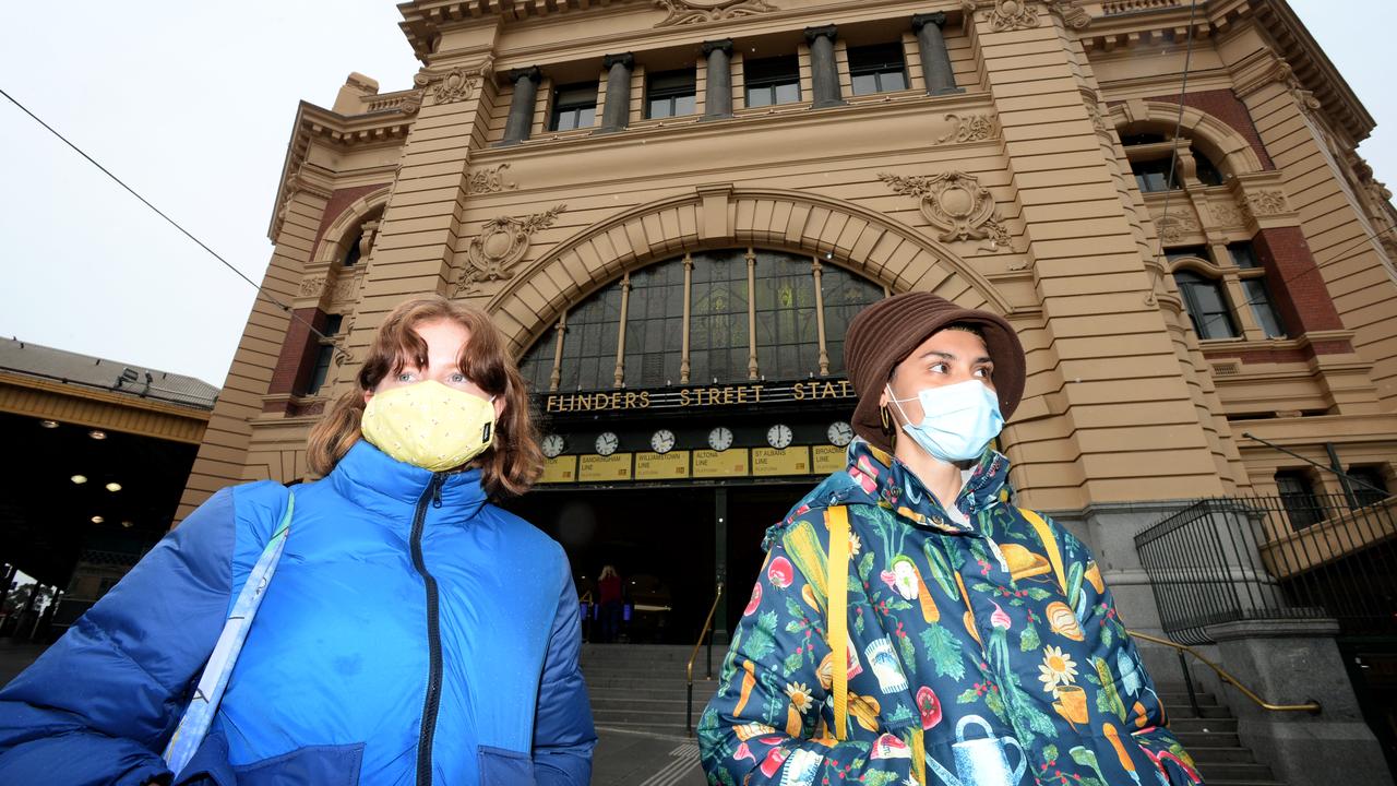 Wearing a face mask when leaving your home in Greater Melbourne becomes mandatory from midnight. Picture: NCA NewsWire/Andrew Henshaw