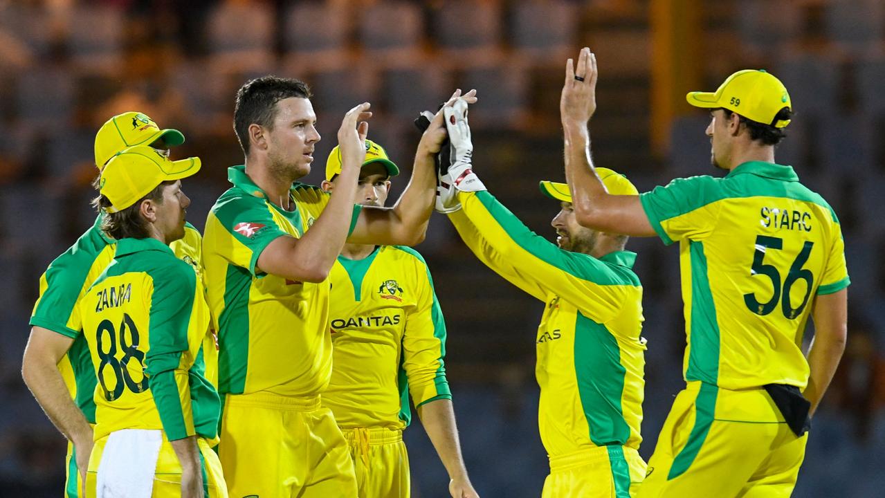 Josh Hazlewood celebrates the dismissal of Lendl Simmons during the West Indies tour. Picture: Randy Brooks / AFP)