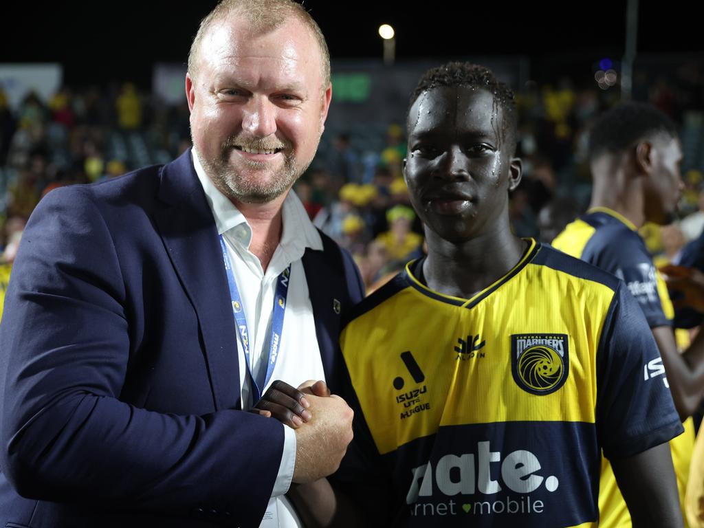 Mariners CEO Shaun Mielekamp with Garang Kuol. Picture: Scott Gardiner/Getty Images