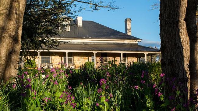 A 1864 six-bedroom stone and brick homestead stands at Funny Hill.