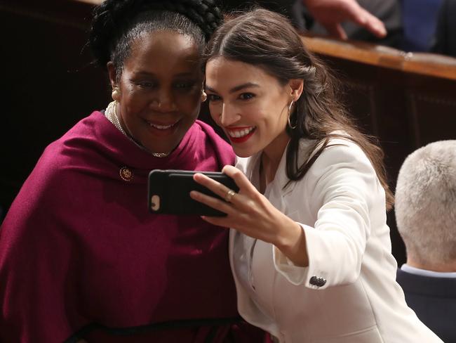 Ms Ocasio-Cortez, pictured with Texas Democrat Sheila Jackson-Lee, has become one of the most popular and outspoken members of the party. Picture: Mark Wilson/Getty Images/AFP 