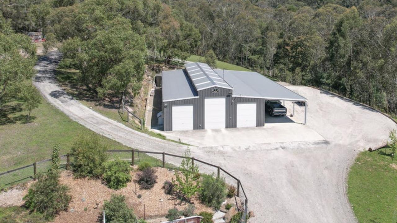 This Pakenham Upper home at<a href="https://www.realestate.com.au/property-acreage+semi-rural-vic-pakenham+upper-146516056?sourcePage=rea:p4ep:property-details&amp;sourceElement=avm-currently-advertised-view-listing" target="_self"> 945 Toomuc Valley Rd</a> features a shed large enough for restoring vintage vehicles.