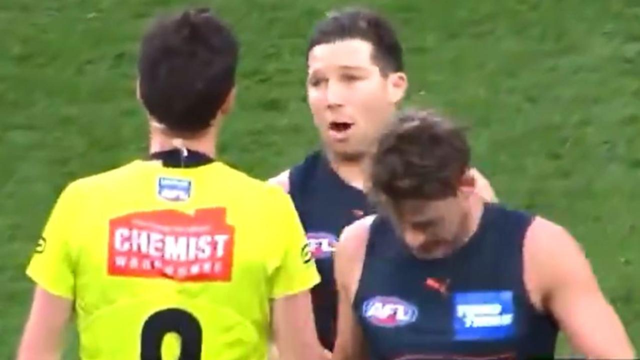 Giants star Toby Greene walks towards umpire Matt Stevic during the elimination final in Launceston. Picture Fox Sports