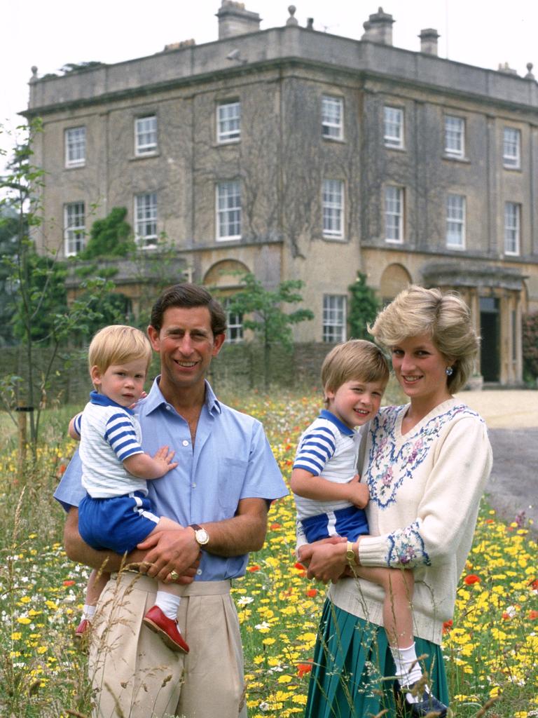 Princes Harry and William as children with their parents Charles and Diana at Highgrove in 1986. Picture: Tim Graham Photo Library via Getty Images