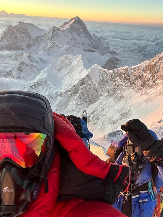 Terry Ledgard at sunrise below the south summit 1 in May. Picture: Josh McDowell.