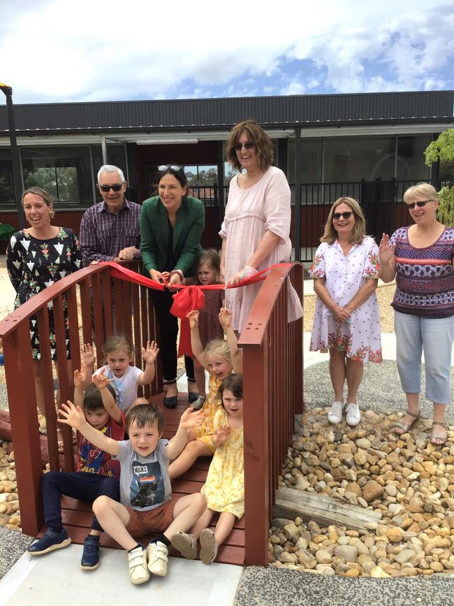 Ribbon cutting ceremony at PIELC. Pictured: Sarah Tyrell, Cr Mayor Michael Wheelan, State Member for Bass, Jordan Crugnale, Karen Treppo, Sue Becker, Lynne Hadley with help from Gemma, Jacqueline, Fergus, Ashley, Bonnie and Avana.