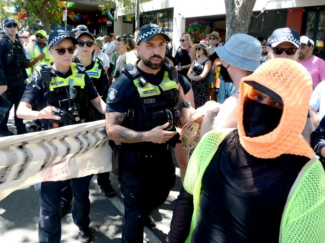 Other protesters had their faces covered. Picture: Andrew Henshaw