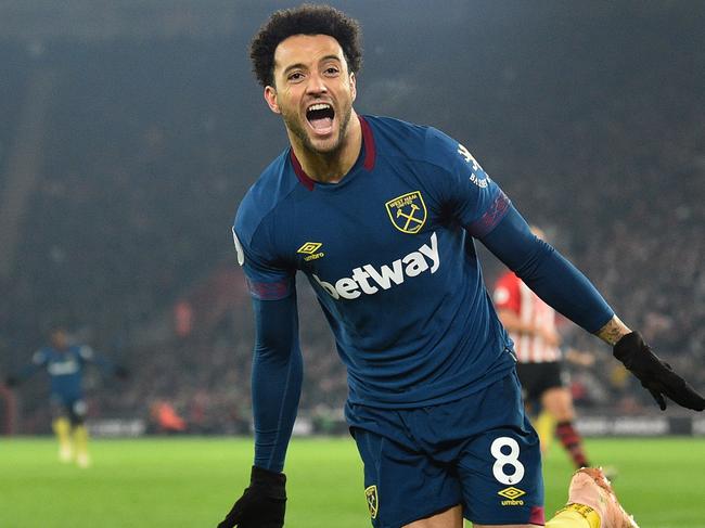 West Ham United's Brazilian midfielder Felipe Anderson celebrates after scoring their second goal during the English Premier League football match between Southampton and West Ham United at St Mary's Stadium in Southampton, southern England on December 27, 2018. (Photo by Glyn KIRK / AFP) / RESTRICTED TO EDITORIAL USE. No use with unauthorized audio, video, data, fixture lists, club/league logos or 'live' services. Online in-match use limited to 120 images. An additional 40 images may be used in extra time. No video emulation. Social media in-match use limited to 120 images. An additional 40 images may be used in extra time. No use in betting publications, games or single club/league/player publications. /