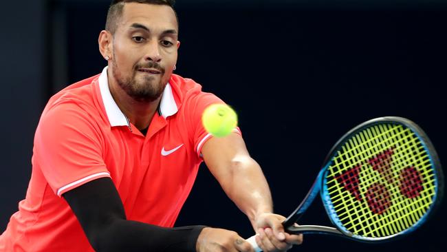 Nick Kyrgios plays a backhand against Jeremy Chardy at the Brisbane International on Wednesday. Picture: Getty Images 