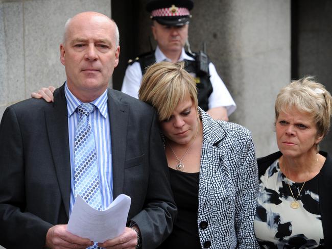 Bob and Sally Dowler, parents of murdered schoolgirl Milly Dowler and her sister Gemma (centre), read a statement to the media outside the Old Bailey in London after Levi Bellfield was found guilty of Milly’s murder. Picture: PA