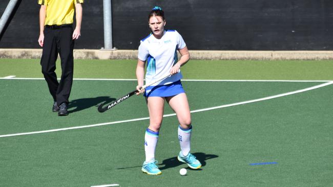 A Metro-South West player examines her options at the NSW U-18's girls hockey championships, May 21.