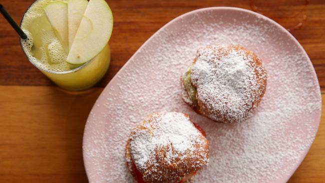 Sweet treat: The sweet burger is two sweet potato doughnuts, Japanese whisky cream, matcha white chocolate and fresh strawberries.