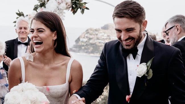 Fox Sports presenter Hannah Hollis on her wedding day with partner Tom Lee.