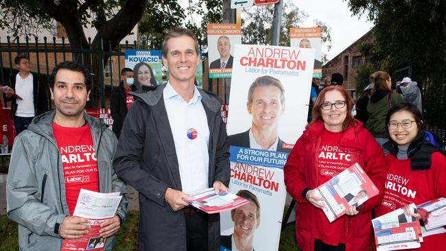 Labor candidate Andrew Charlton (second from left) with volunteers including Granville state Labor MP Julia Finn at Granville Public School. Picture: Brendan Read