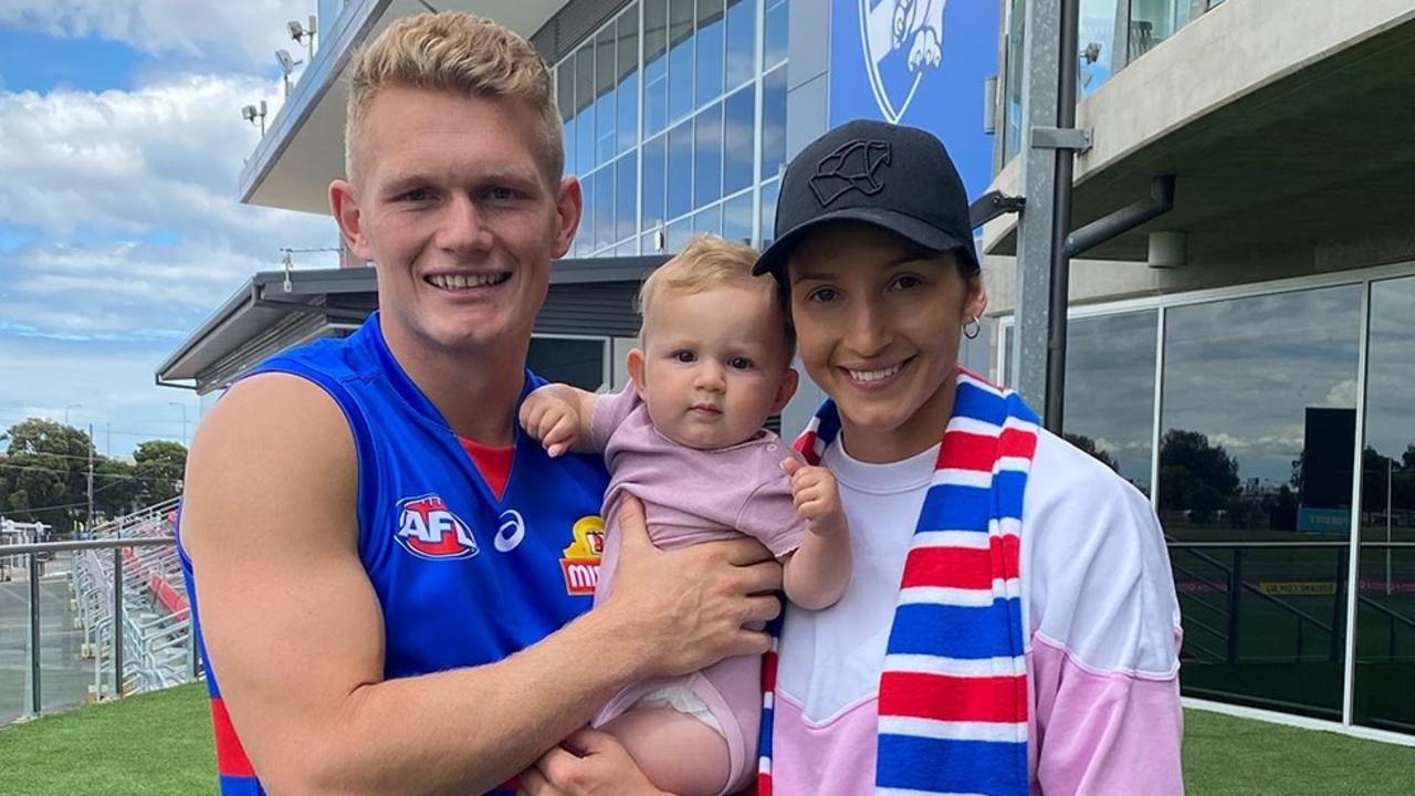 Treloar and wife Kim Ravallion, with daughter Georgie, after signing with the Bulldogs.