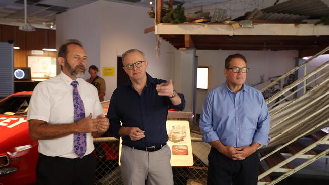 Territory historian Jared Archibald, Prime Minister Anthony Albanese and Member for Solomon Luke Gosling at the MAGNT Cyclone Tracy exhibition on December 24, 2024. Picture: Sam Lowe