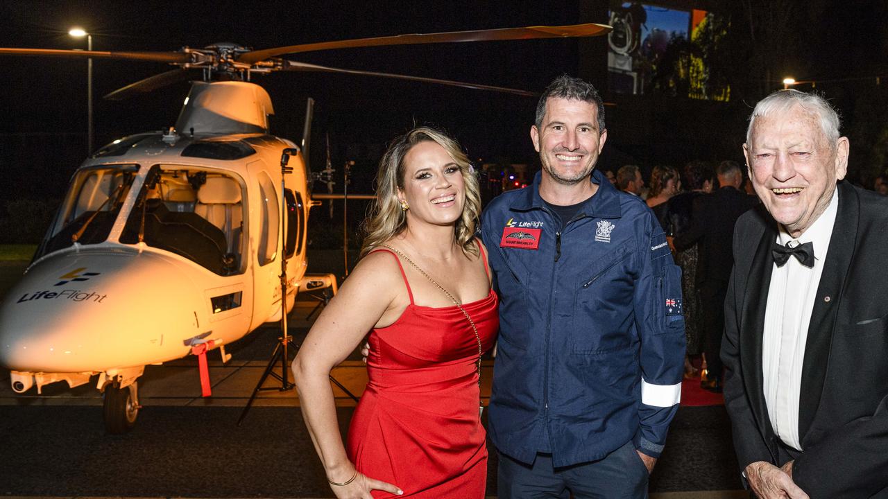 Clive Berghofer AM with Toowoomba LifeFlight pilot Shane Brearley and wife Ange Brearley at the LifeFlight Toowoomba Gala at The Goods Shed, Saturday, May 24, 2025. Picture: Kevin Farmer