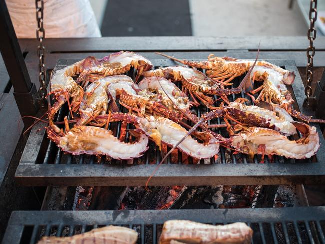 Lobsters on the grill at Pirate Life, Port Adelaide. Picture: DUYDASH