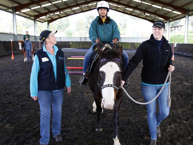 Dosomethingday with volunteers at work at Riding for the Disabled Tall Timbers Centre,Box Hill.Rouse Hill Times at 10am.Julie Wilson with Edita and Annie Niemiec