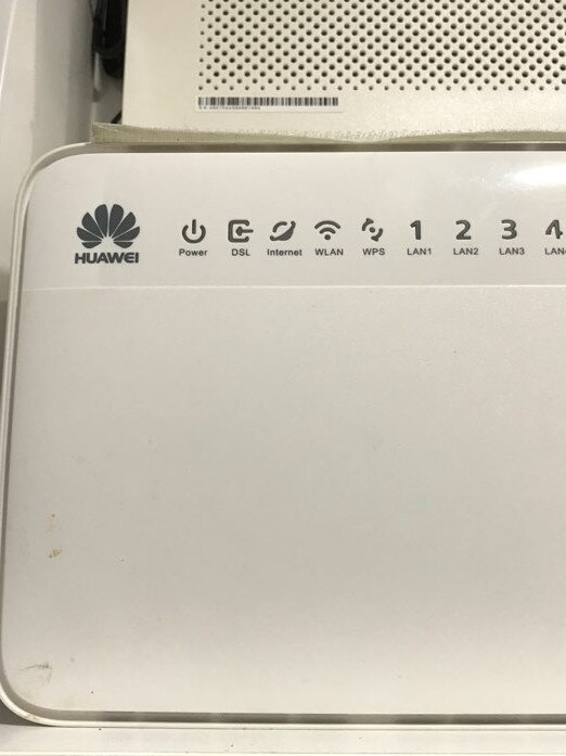 A built-in Huawei router that was there when a Sydney man moved into his Meriton apartment in Parramatta recently.