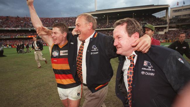 Captain Mark Bickley, coach Malcolm Blight and operations manager John Reid celebrate at the final siren in the 1997 grand final