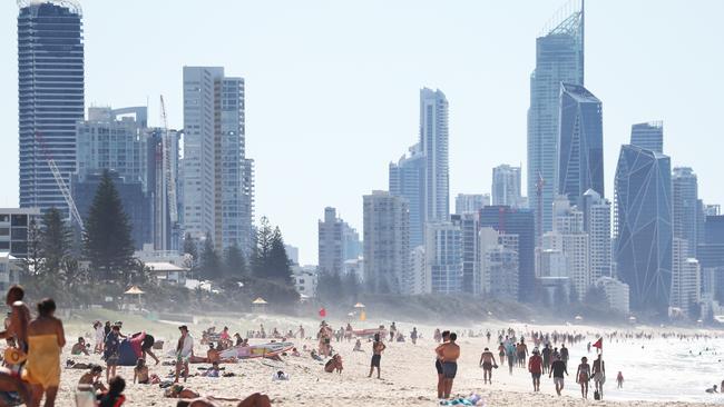 People on the beach at Broadbeach on the Gold Coast.Photograph : Jason O'Brien