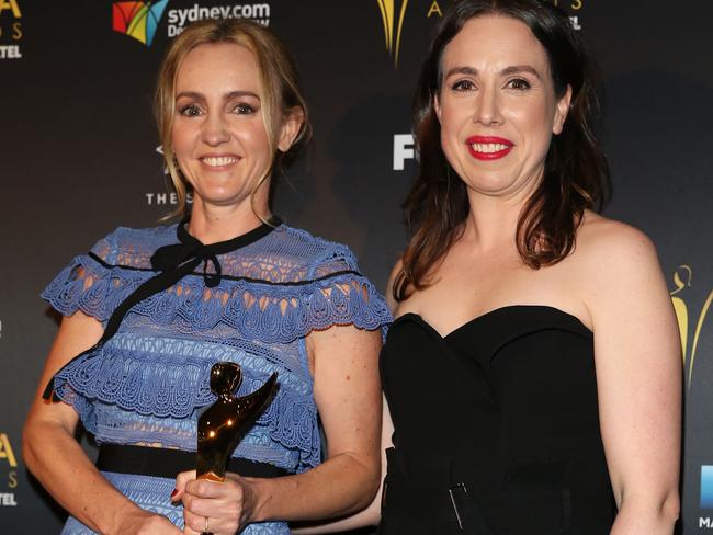 Sarah Scheller and Alison Bell after winning the AACTA Award for Best Screenplay in Television for ABC Comedy Showroom - The Letdown. Picture: Caroline McCredie/Getty