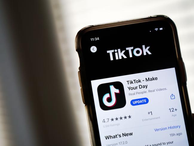 WASHINGTON, DC - AUGUST 07: In this photo illustration, the download page for the TikTok app is displayed on an Apple iPhone on August 7, 2020 in Washington, DC. On Thursday evening, President Donald Trump signed an executive order that bans any transactions between the parent company of TikTok, ByteDance, and U.S. citizens due to national security reasons. The president signed a separate executive order banning transactions with China-based tech company Tencent, which owns the app WeChat. Both orders are set to take effect in 45 days. (Photo Illustration by Drew Angerer/Getty Images) == FOR NEWSPAPERS, INTERNET, TELCOS & TELEVISION USE ONLY ==