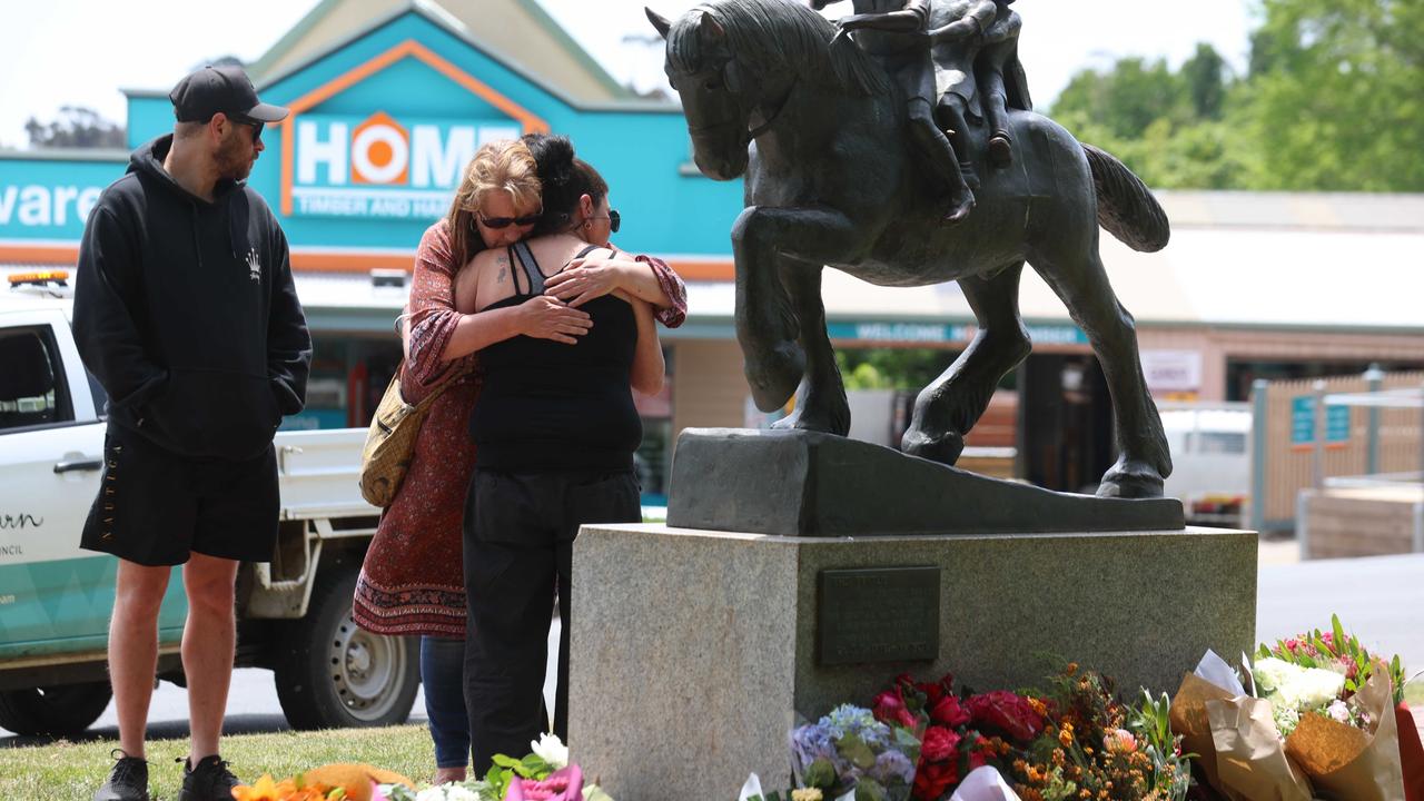 People leave flowers at the Royal Daylesford Hotel after five people were killed on Sunday evening. Picture: NCA NewsWire / Brendan Beckett